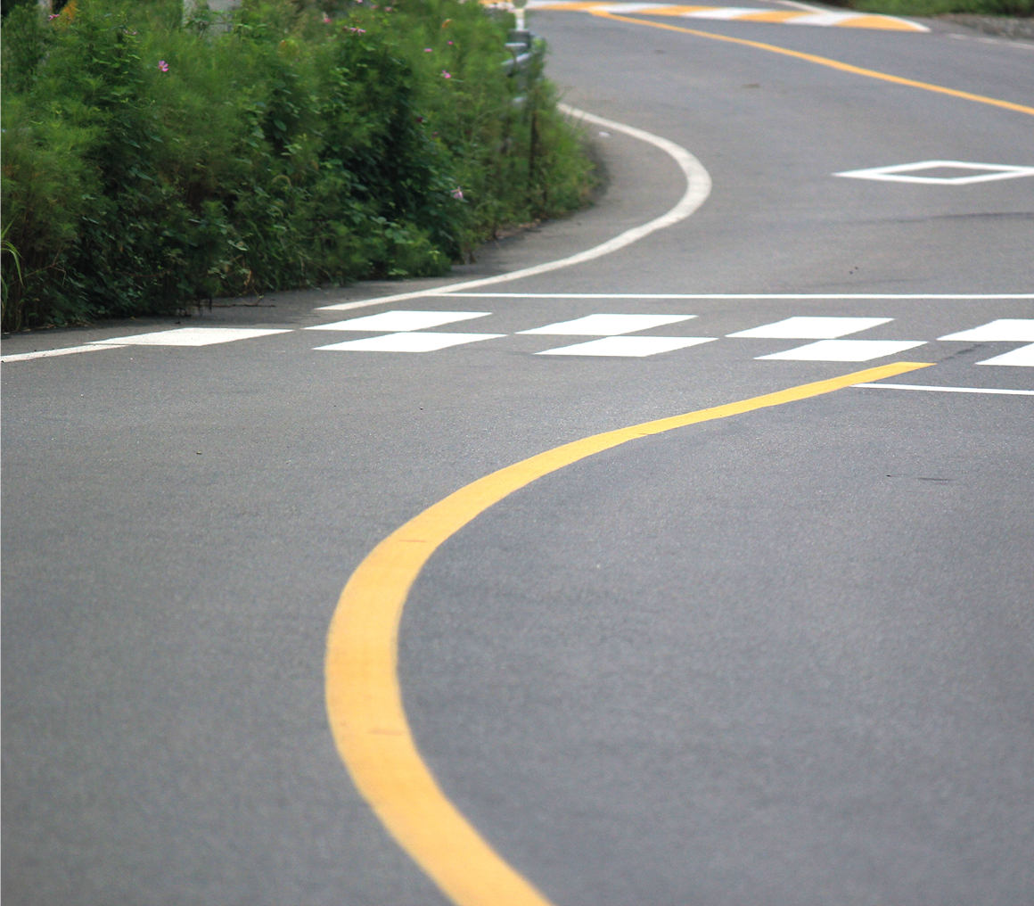 Winding road with checkerboard markings