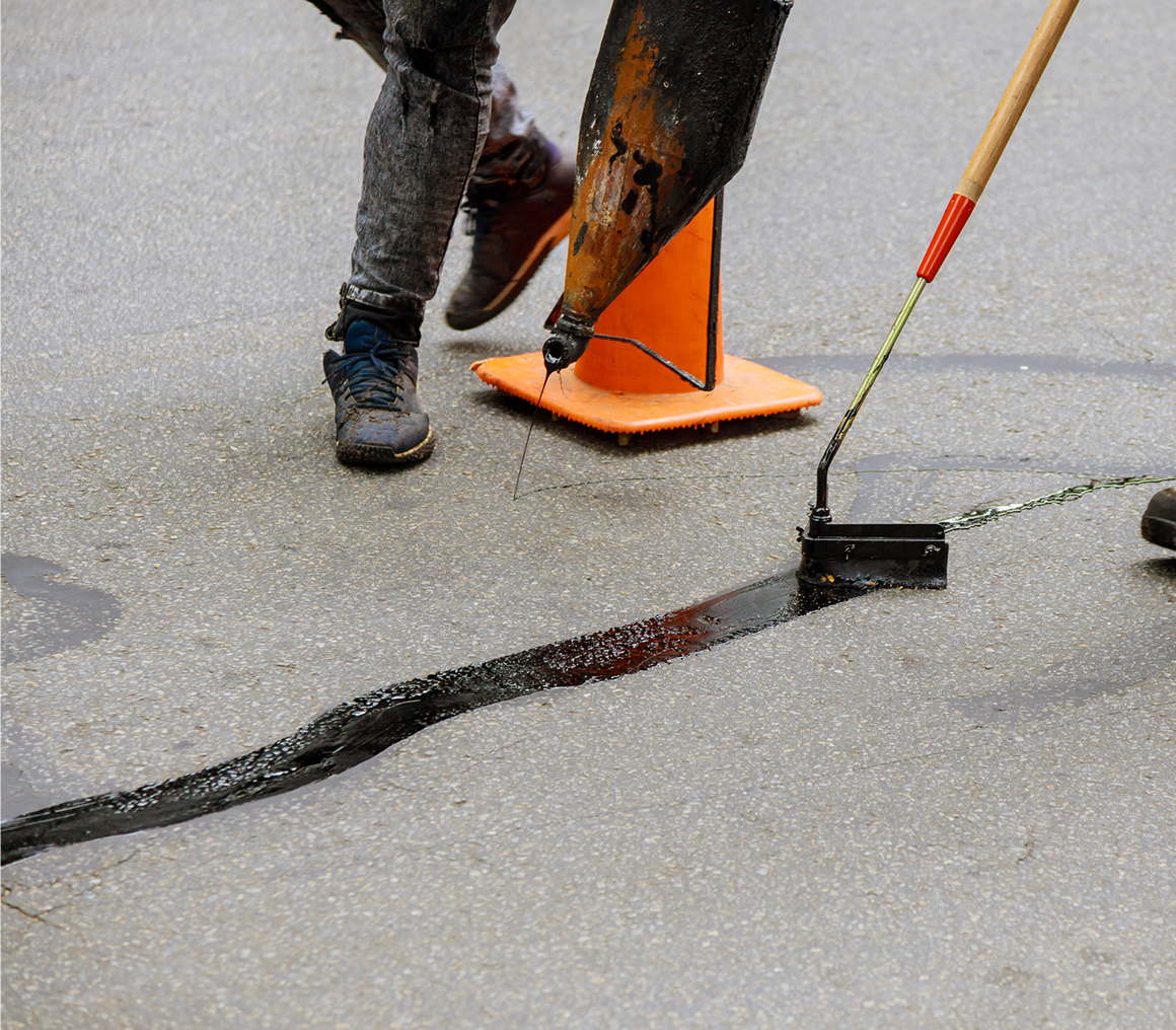 Street maintenance with orange cone