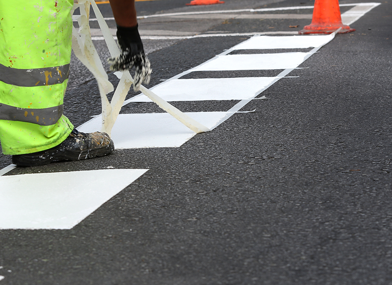 Road maintenance with safety cones